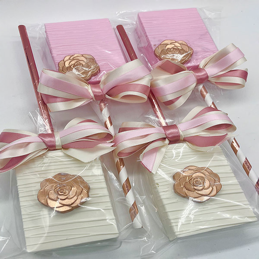 Pink, white and rose gold rice krispie treats.